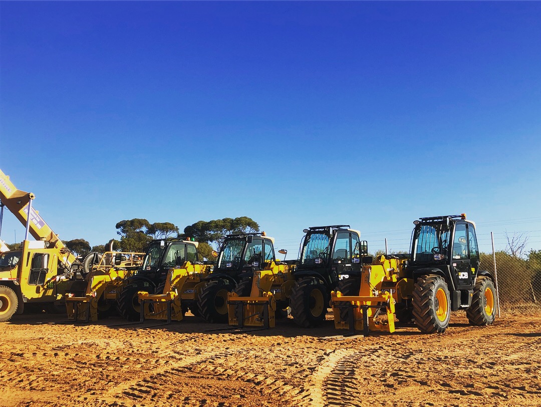 4 telehandlers in a row