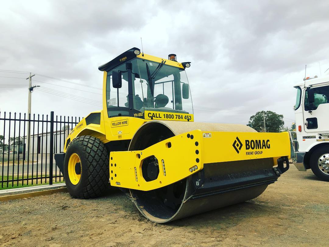 Yellow Hire steam-rollers