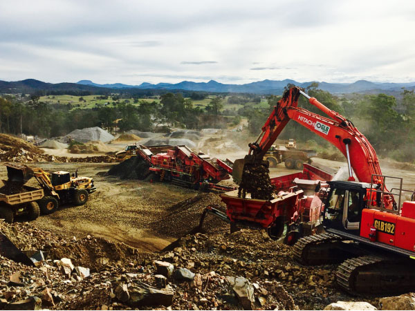 Byrne-Resources-Group-Pacifico-excavator-loading-crusher