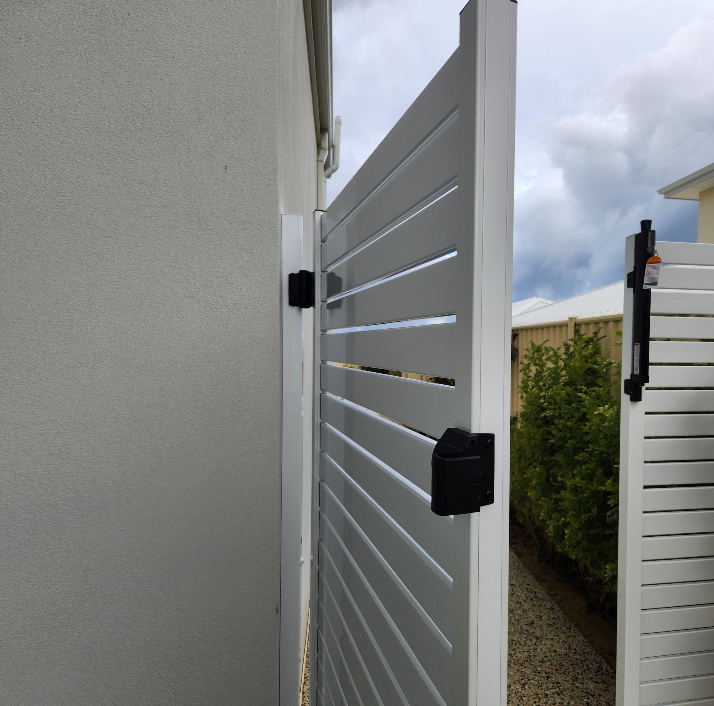 Custom made aluminium slat fencing, gates and privacy screens by Secure Fit Fencing, Perth WA